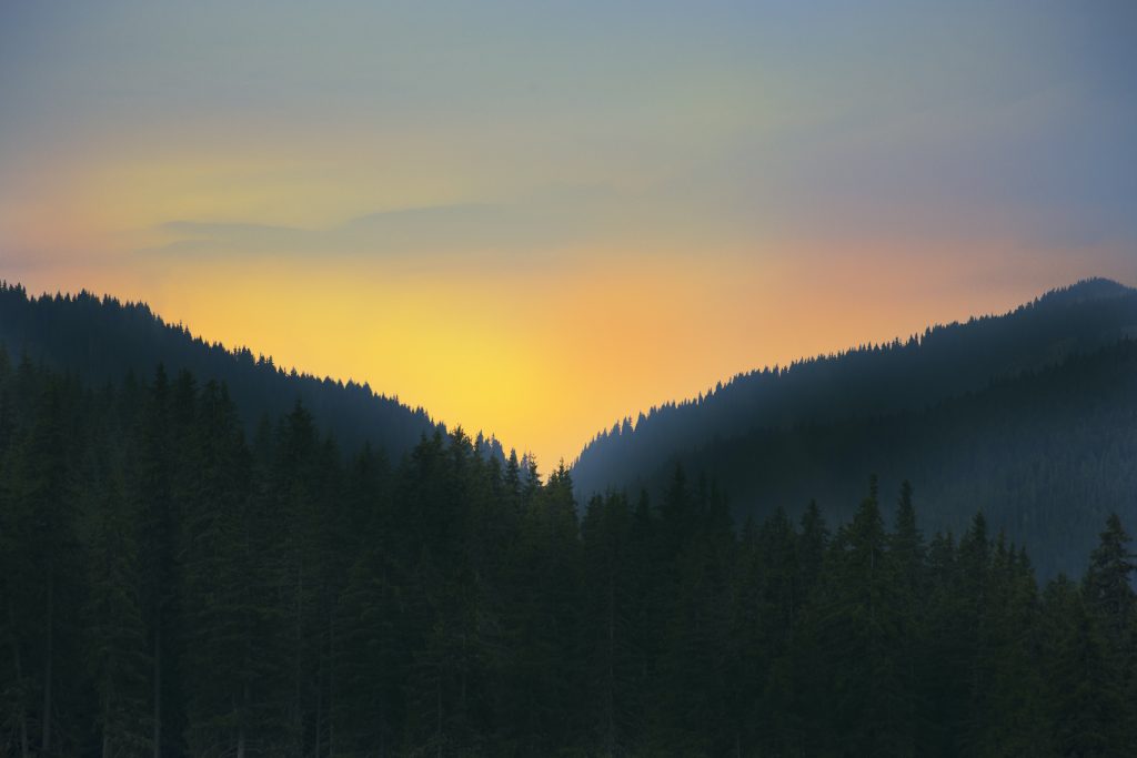 Pre-Sunrise Glow Over Mountains